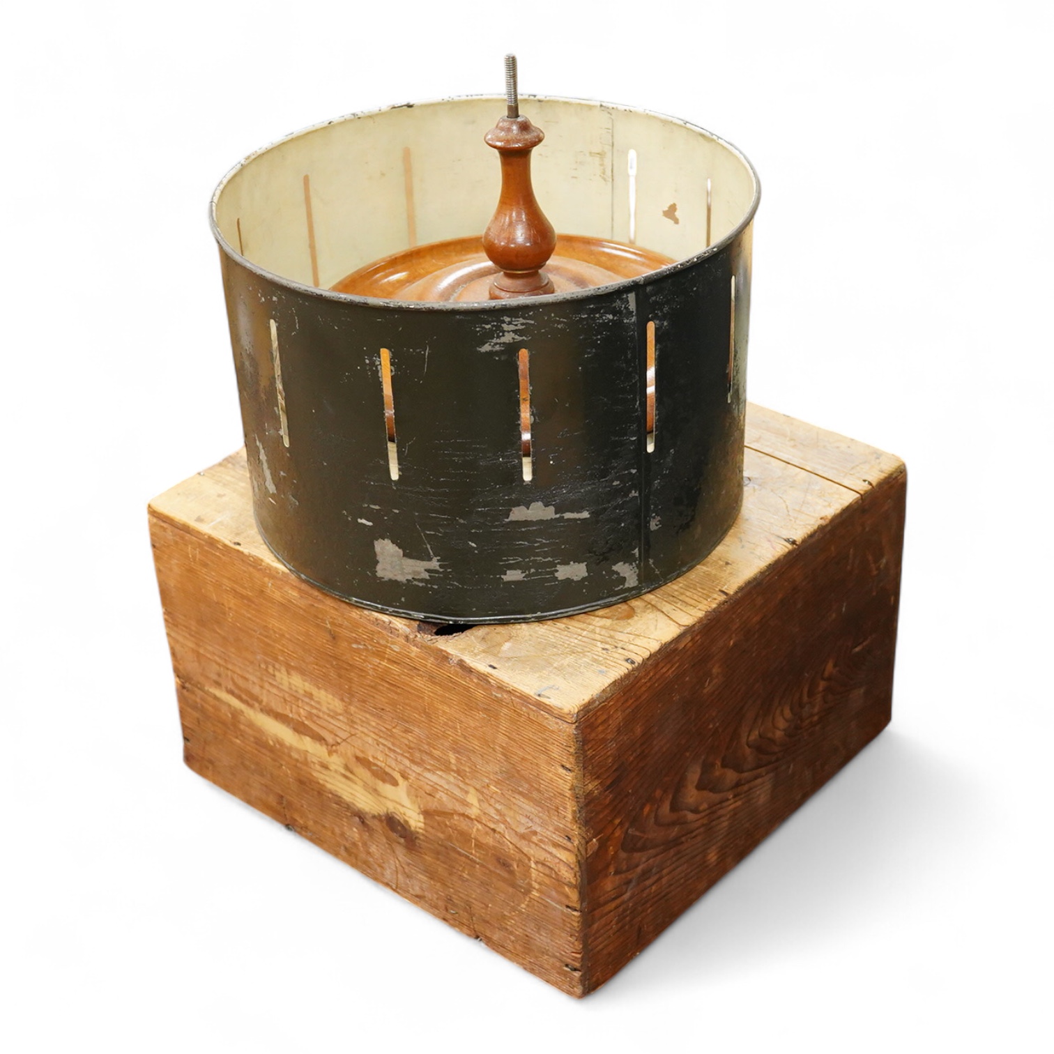 A late 19th century painted tin and mahogany zoetrope by the London Stereoscopic Co. with a number of paper inserts, diameter 30cm